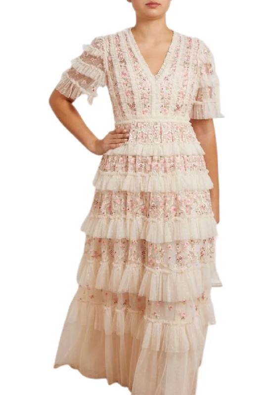 Sporty-chic women’s apparel for active lifestyles   Nude Calathea Ruffled Gown
